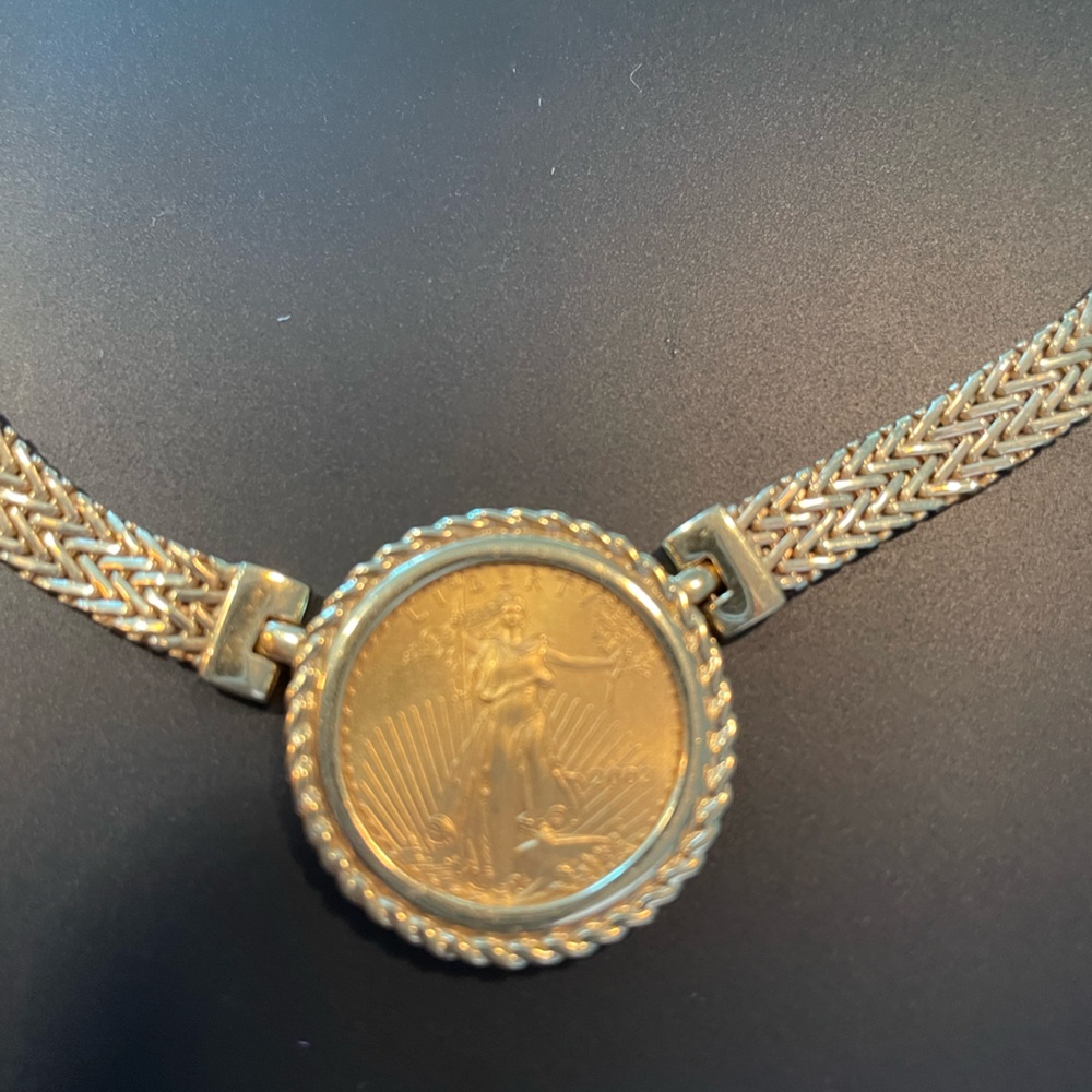 $25 Gold Liberty Coin Pendant with 14kt solid gold chain.